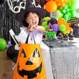 Orange jack-o-lantern trick-or-treat bag with handles